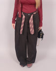 Pantalone balloon nero con cravatta