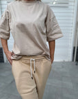 T-shirt over beige