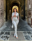Tuta luxury diamond bianca con maniche a guanto
