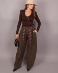 Pantalone balloon verde con cravatta