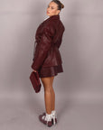 Giacca in pelle con spalline bordeaux
