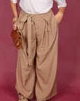 Pantalone palazzo con fiocco fango