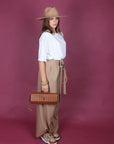 Pantalone palazzo con fiocco fango