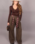 Pantalone balloon verde con cravatta