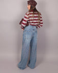 Jeans palazzo chiaro con microcristalli