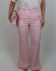 Pantalone con spacchi sul fondo rosa
