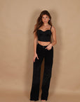 Jeans palazzo nero con microcristalli