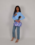 Jeans momfit sfrangiato sul fondo