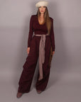 Pantalone palazzo bordeaux con cintura a quadri