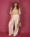 Pantalone palazzo con fiocco panna