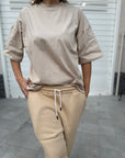 T-shirt over beige
