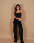 Jeans palazzo nero con microcristalli