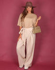 Pantalone palazzo con fiocco panna