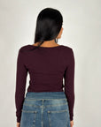 Maglia costine prugna
