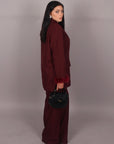 Tailleur con piume bordeaux
