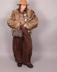 Pelliccia beige sfumata con cappuccio