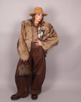 Pelliccia beige sfumata con cappuccio