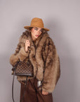 Pelliccia beige sfumata con cappuccio