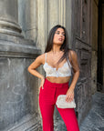 Bralette in pizzo bianco e nude con bottoni