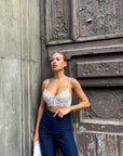 Bralette in pizzo bianco e nude con bottoni