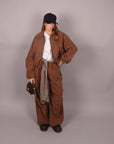 Pantalone palazzo brown con cintura a quadri