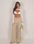 Tailleur jolie con cintura beige